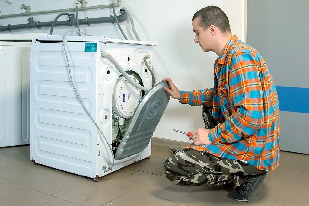 Процесс разборки стиральной машинки
